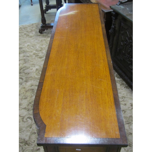 2324 - A good quality reproduction Georgian revival bow fronted satinwood serving table crossbanded in rose... 