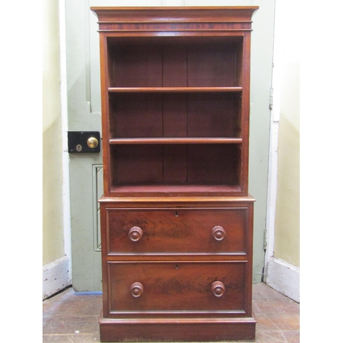 2678 - A Victorian mahogany cabinet of small proportions, the lower section enclosed by two frieze drawers,... 