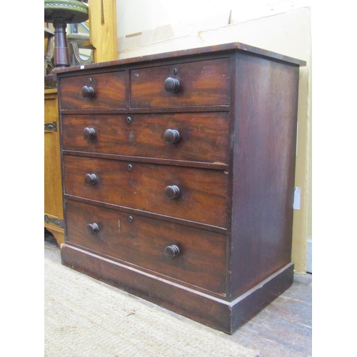 2682 - A Victorian mahogany chest of three long and two short drawers set on a plinth base, with oak lining... 