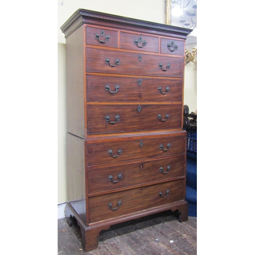 2788 - A Georgian mahogany oak lined chest on chest of six long and three short drawers with cast brass fit... 