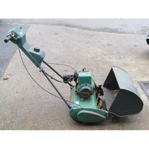 2613 - A Qualcast Suffolk Punch 43S petrol cylinder lawn mower and box