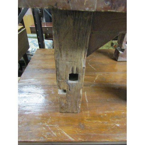 2624 - A rustic oak occasional table partially in oak raised on four square cut supports, together with a m... 