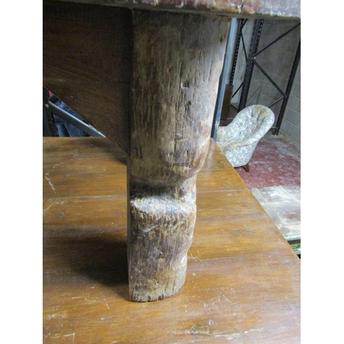 2624 - A rustic oak occasional table partially in oak raised on four square cut supports, together with a m... 