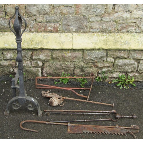 2162 - A large wrought iron Arts & Crafts style andiron together with a 19th century chimney crane, two fir... 