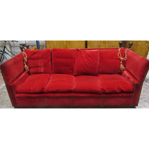 2628 - A pair of very large knoll sofas of traditional form upholstered in red velvet with bar stud detail,... 