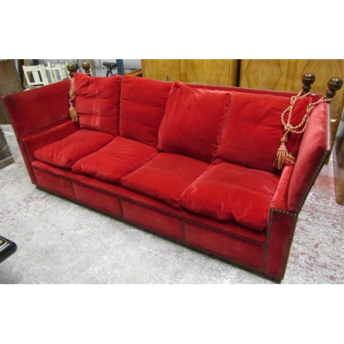 2628 - A pair of very large knoll sofas of traditional form upholstered in red velvet with bar stud detail,... 