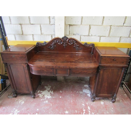 2659 - A Regency mahogany pedestal sideboard, the pedestals with panelled doors and frieze drawers, column ... 