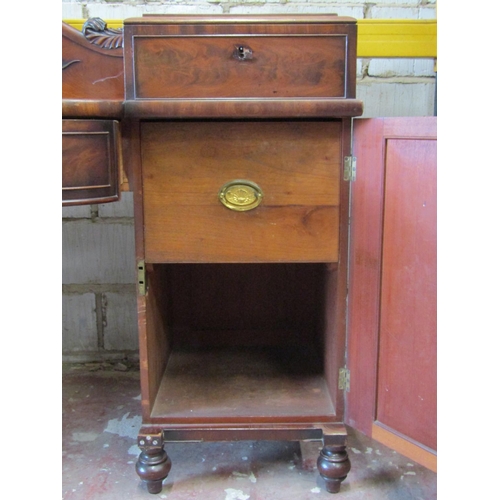 2659 - A Regency mahogany pedestal sideboard, the pedestals with panelled doors and frieze drawers, column ... 