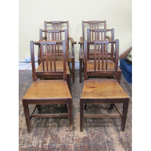 2779 - A set of eight (6+2) dining chairs with stick backs and solid seats on square cut supports