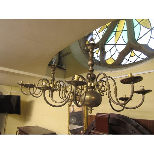 2802 - Two similar Dutch brass ceiling lights each with eight branches, 50cm diameter x 70cm high and small... 