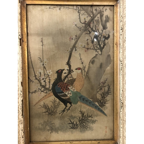 107 - Three framed Chinese paintings on silk of birds in trees (early 20th century), two bearing red seal ... 