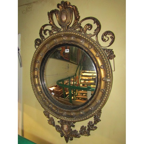 2796 - A good quality Regency mahogany convex wall mirror with original gilded finish, the mirror plate 48c... 