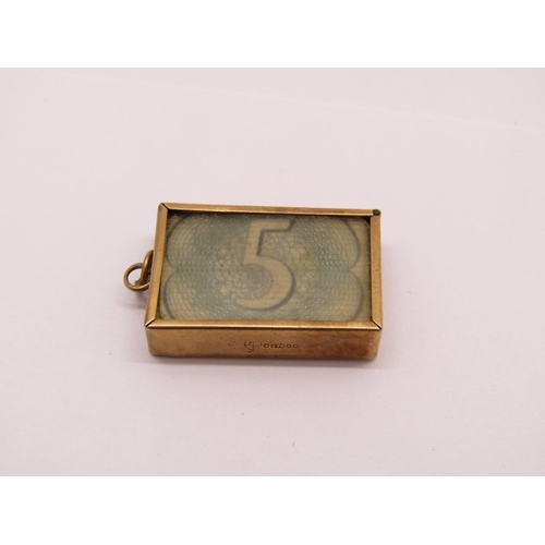 1359 - Two 9ct novelty charms comprising a lucky pixie and an 'In emergency break glass' five pound note ch... 