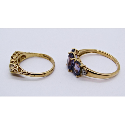 1388 - Two 9ct amethyst rings, one with diamond set shoulders, 5.9g total (2)