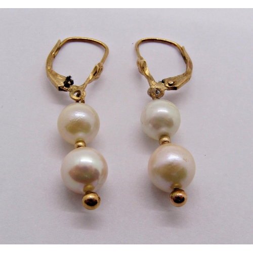 1399 - Three pairs of 9ct earrings comprising a pair of seed pearl tassel drops, a further pair of graduate... 