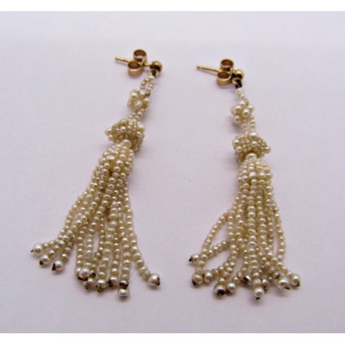 1399 - Three pairs of 9ct earrings comprising a pair of seed pearl tassel drops, a further pair of graduate... 