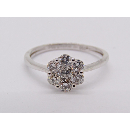 1417 - Contemporary 18ct white gold diamond daisy cluster ring, 0.50ct total, size M, 1.9g