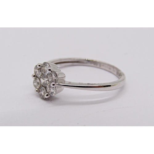 1417 - Contemporary 18ct white gold diamond daisy cluster ring, 0.50ct total, size M, 1.9g