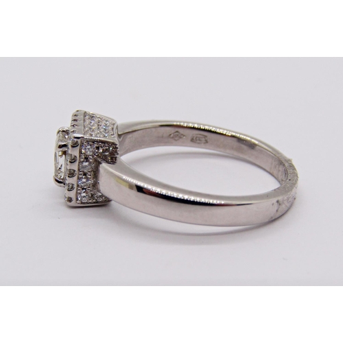 1418 - 18ct white gold princess-cut diamond cluster ring, sides of the setting pavé set with further diamon... 