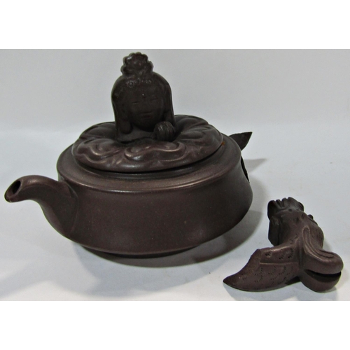 1733 - A Chinese carved wooden ink stand with goats, a clay Chinese teapot on a box, a copper Chinese three... 