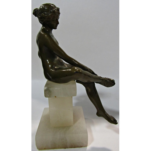 1735 - A classical  bronze  statue of Aphrodite adjusting her sandal mounted on a marble plinth, 18cm high.... 