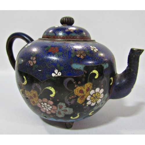 1742 - A small Japanese cloisonné round teapot with overall floral decoration on a tripod base. 10.5cm high... 