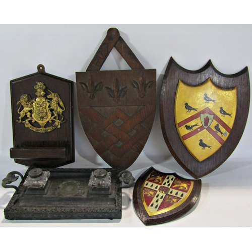 1781 - A collection of wooden heraldic badges, a cutlery trough, a piecrust table top, an Edwardian oak clo... 