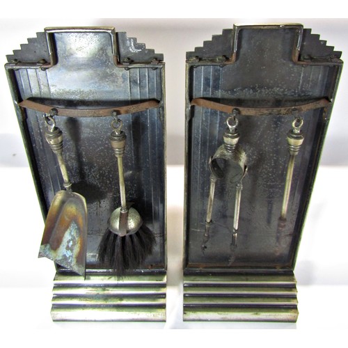 1655 - A pair of Art Deco fireguards with tongs and poker brush and shovel to the rear, a pair of middle Ea... 