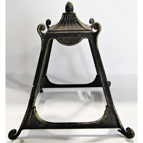 1716 - An outside wall lantern in an antique style finish, with four amber panes of glass