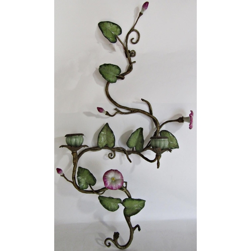 1724 - A pair of brass and china candle wall sconces with pink flowers and green vine leaves each with two ... 