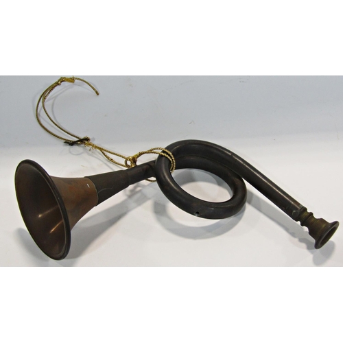 1766 - A small curly copper hunting horn.