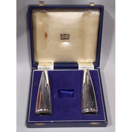 1205 - A pair of Harrods silver salt and pepper pots in original case, 12cm high, 7.2oz approx.