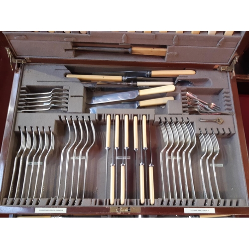 1255A - A canteen of cutlery containing mainly Goldsmiths and Silversmiths silver flatware, 11 main forks, 7... 