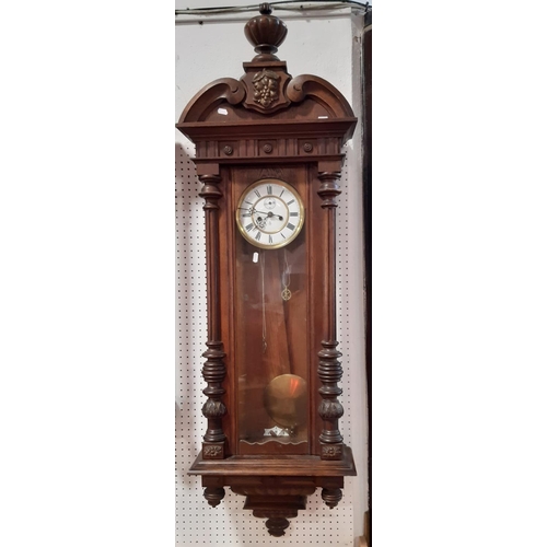 1512 - A 19th century oak cased Vienna style wall clock with twin train weight driven movement by Gustav Be... 