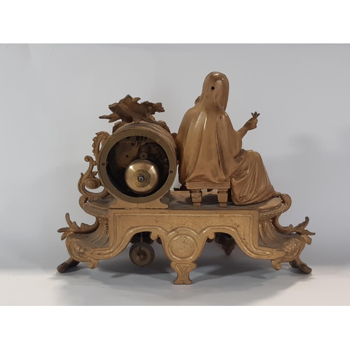 1515 - 19th century gilt brass mantle clock, the decorative case showing mother and child with eight day st... 