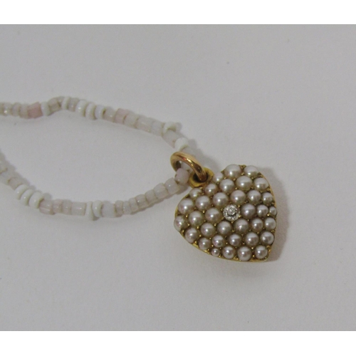 1440 - Collection of antique jewellery comprising a yellow metal heart shaped pendant pavé set with pearls ... 