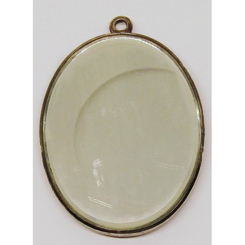 1172 - A Rene Lalique oval glass pendant of Psyche with a mirror to the reverse, 8cm.