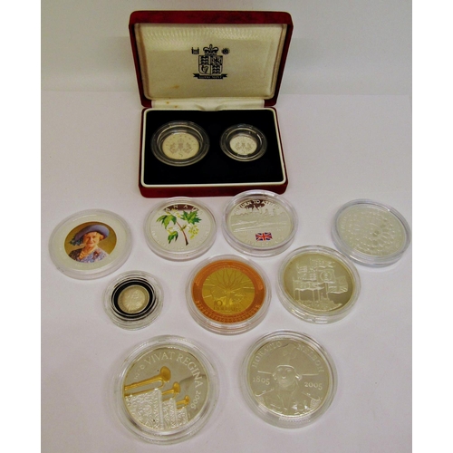 531 - A collection of 10 proof silver coins including 2005 Nelson Crown, 1990 50p two coin set, 2002 Cook ... 