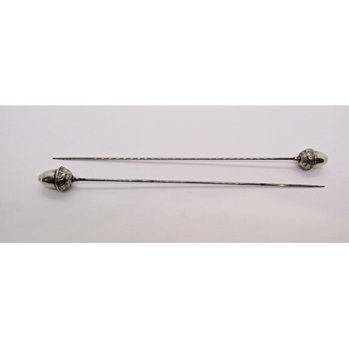 1439 - Pair of Edwardian silver hat pins with acorn terminals, contained in a fitted period case