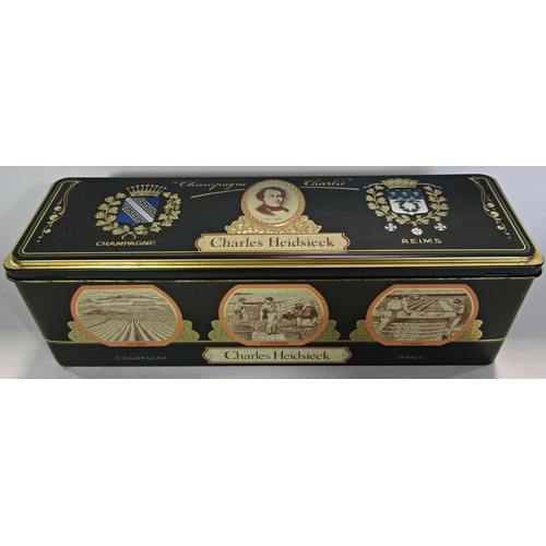 1825 - A bottle of Charles Heidsieck Champagne Cuvee, 1979, 75cl, in a presentation tin box.