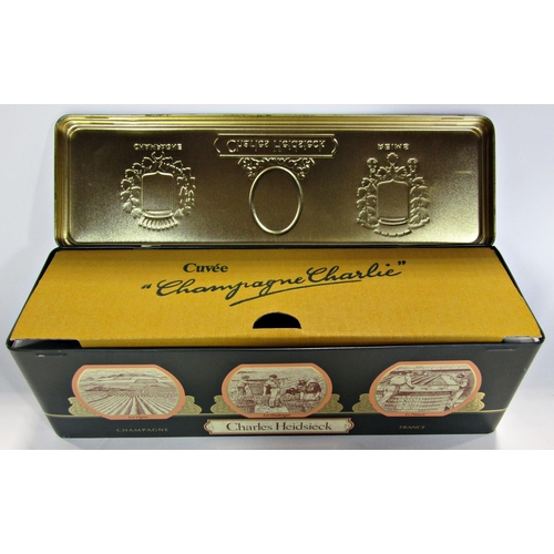 1825 - A bottle of Charles Heidsieck Champagne Cuvee, 1979, 75cl, in a presentation tin box.