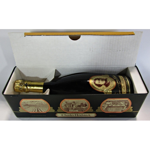 1825 - A bottle of Charles Heidsieck Champagne Cuvee, 1979, 75cl, in a presentation tin box.