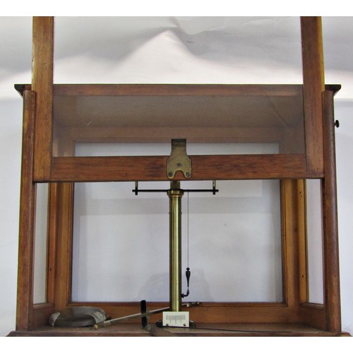 1815 - A mahogany Chemists scale with brass scale and a ratcheted glazed front door