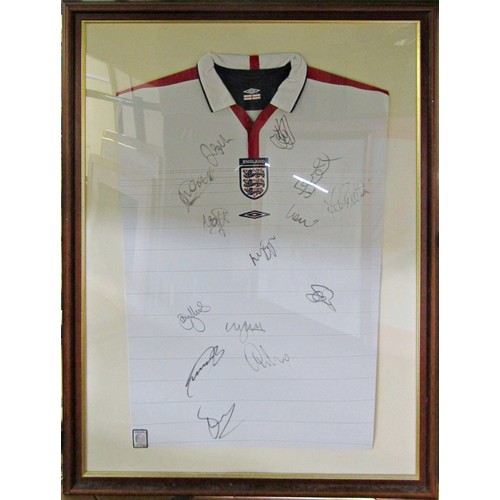 128A - England Football Shirt for 2004, signed by team members, in wooden and gilt frame