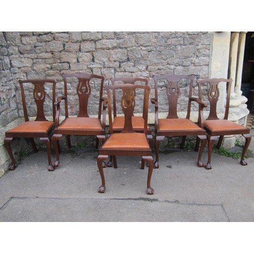 2772A - Six (4+2) Edwardian mahogany dining chairs with carved and pierced splats, upholstered seats set on ... 