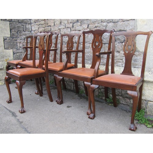 2772A - Six (4+2) Edwardian mahogany dining chairs with carved and pierced splats, upholstered seats set on ... 