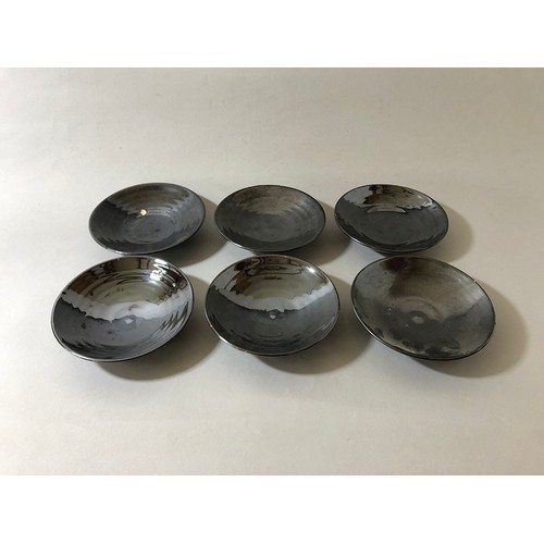 197 - Joanna Constantinidis (British, 1927-2000) - Set of six ceramic bowls with black lustred glaze, impr... 