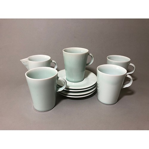 204 - Collection of mugs, saucers and a bowl to include: Sue Binn - blue stripe glazed mug; 'AM' marked mo... 