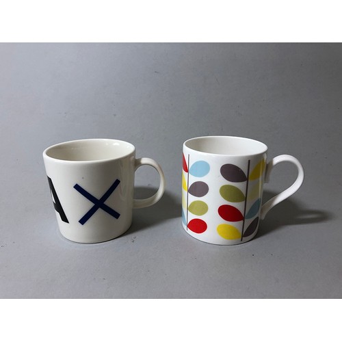 204 - Collection of mugs, saucers and a bowl to include: Sue Binn - blue stripe glazed mug; 'AM' marked mo... 