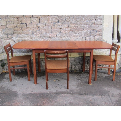 2238 - A White & Newton Ltd long and low retro teak sideboard enclosed by two doors and three long drawers,... 